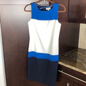 A blue/white dress by Ava & Aiden